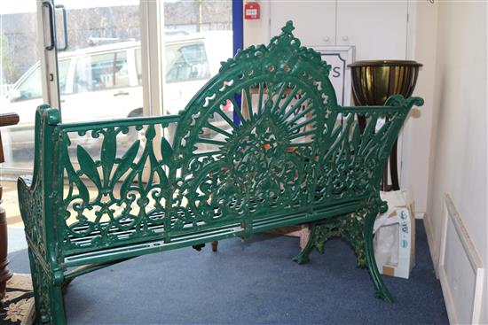 A Coalbrookdale Arabesque pattern cast iron green painted garden bench, W.122cm